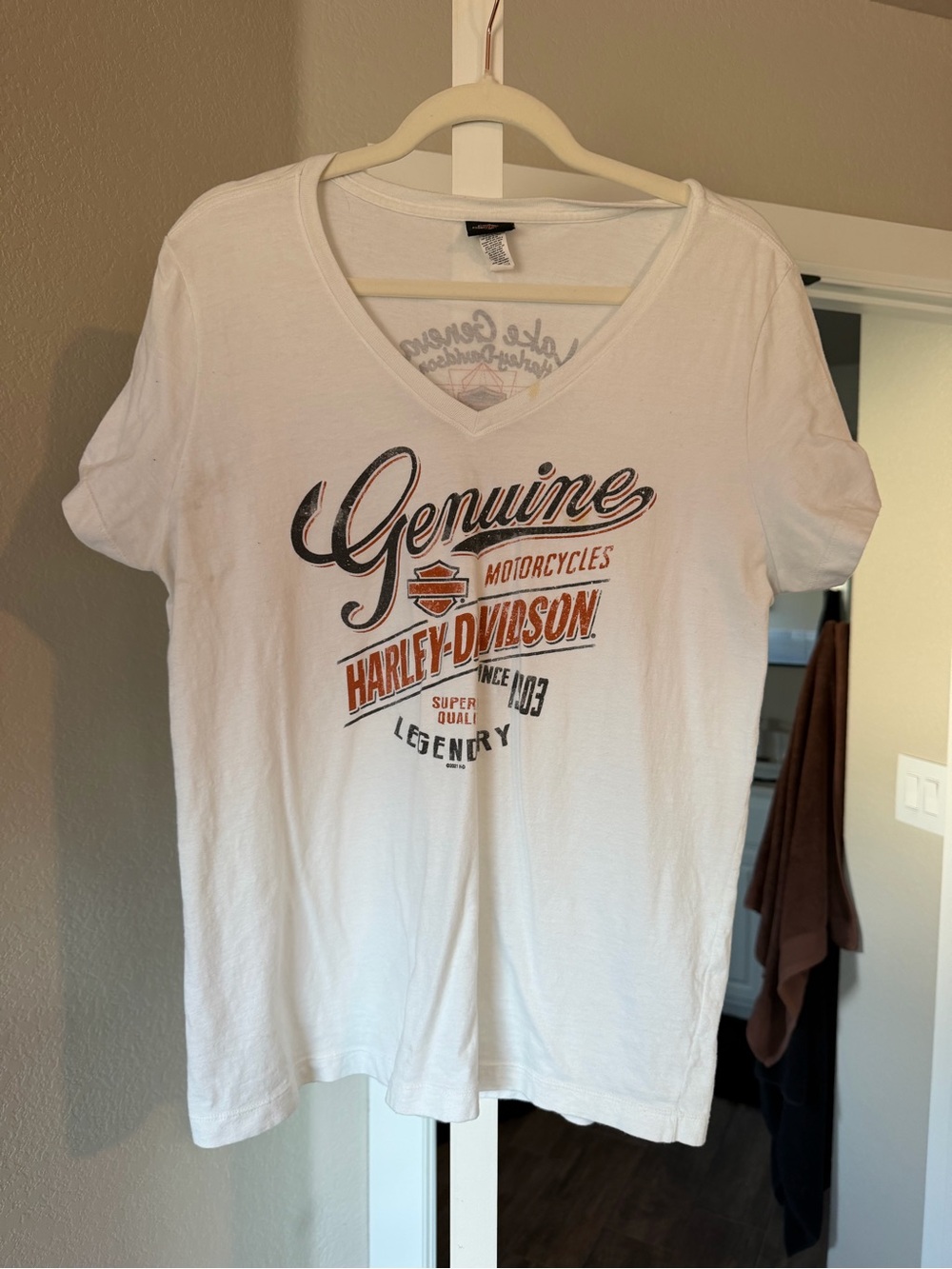 Harley-Davidson Women’s White V-Neck Tee with Orange & Black Logo